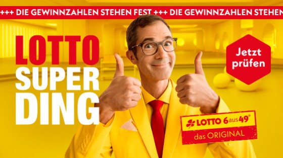 Kampagnenmotiv zum Lotto-SuperDing - Mann im gelben Anzug mit roter Krawatte | WestLotto