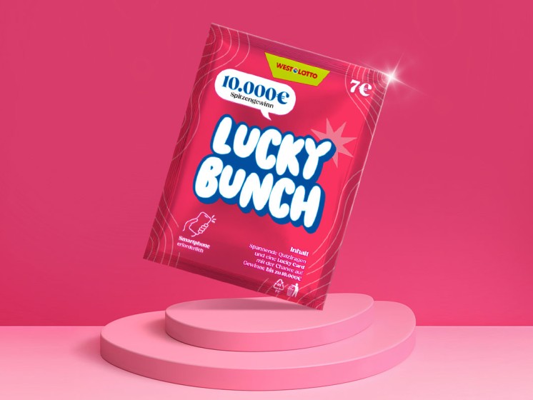 WestLotto-Rubbelquiz Lucky Bunch steht auf pinkem Podest vor pinkem Hintergrund